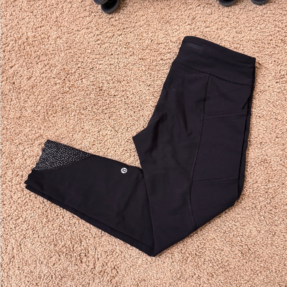 Lululemon Black Leggings with Reflective Bottoms, 25” inseam Size 8